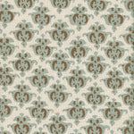Detail of fabric in a repeating damask print in blue and brown on a cream field.