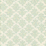 Detail of wallpaper in a repeating damask print in light blue and tan on a cream field.