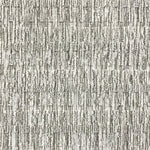 A close-up of a broadloom rug in a vertical ribbed pattern  in a neutral mix of off-white, and gray. 