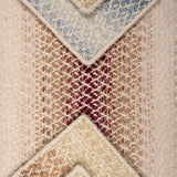 Textural broadloom samples with ombré stripes in various colors.