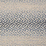 Textural broadloom with an ombré stripe in blue and cream. 