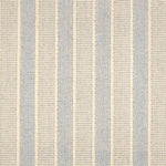 Broadloom carpet in cream and blue stripes.