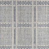 Broadloom carpet in check pattern in shades of blue with cream. 