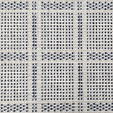 Broadloom carpet in check pattern in shades of dark blue with cream. 