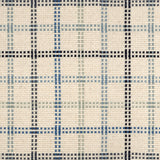 Broadloom carpet in a dashed window pane plaid in shades of blue on a cream field.