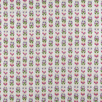 Detail of fabric in a striped botanical print in shades of red, purple and green on a cream field.