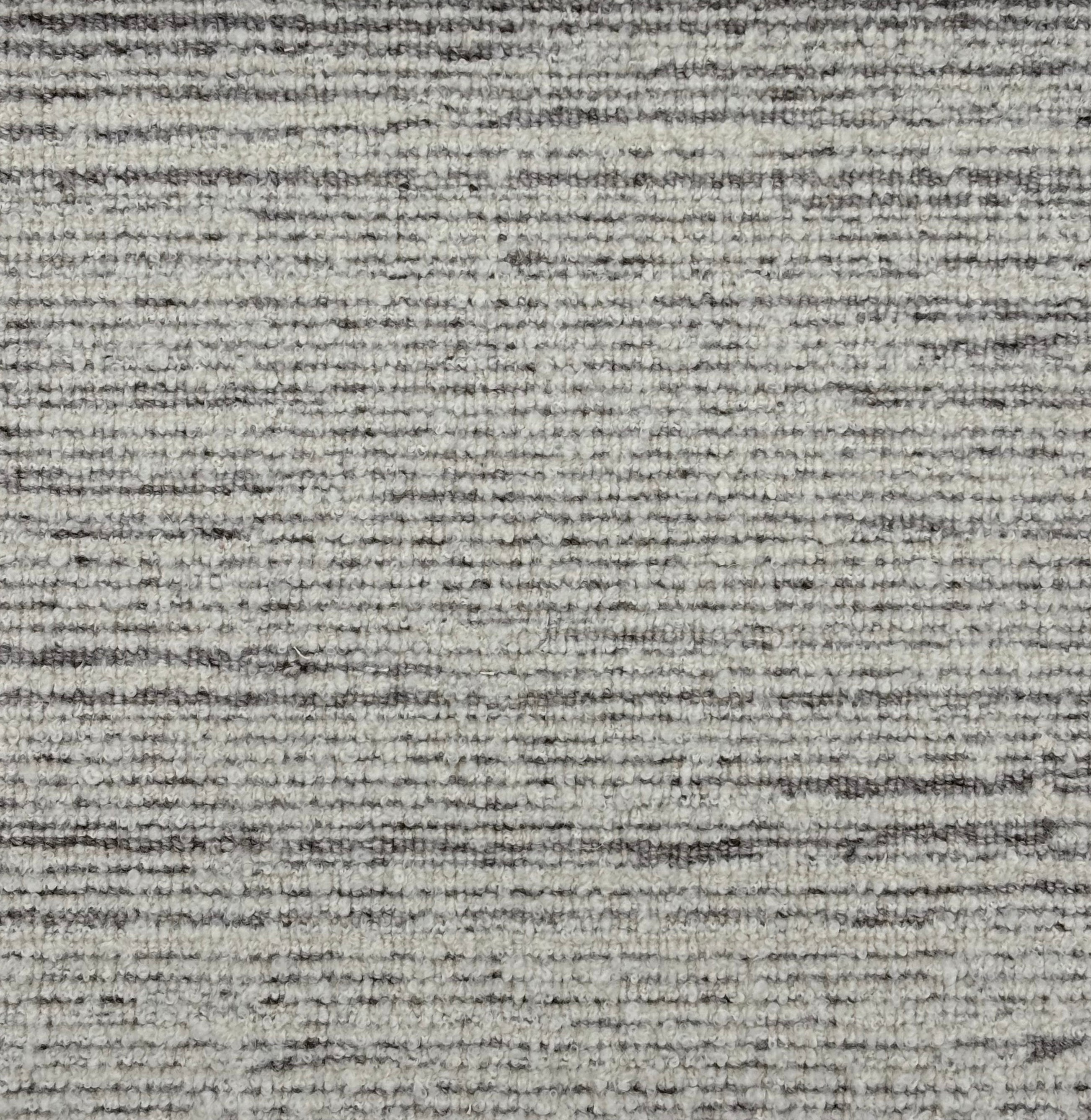 Handknotted rug sample in a textural blend of soft heathered grey and white. 