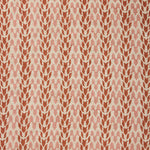 Fabric with a abstract leaf pattern in red and pink on a neutral background