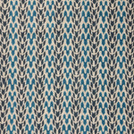 Close up of fabric with abstract leaf pattern in shades of blue. 
