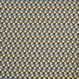 Woven fabric swatch in a repeating mosaic print in shades of blue, rust and gray on a cream field.
