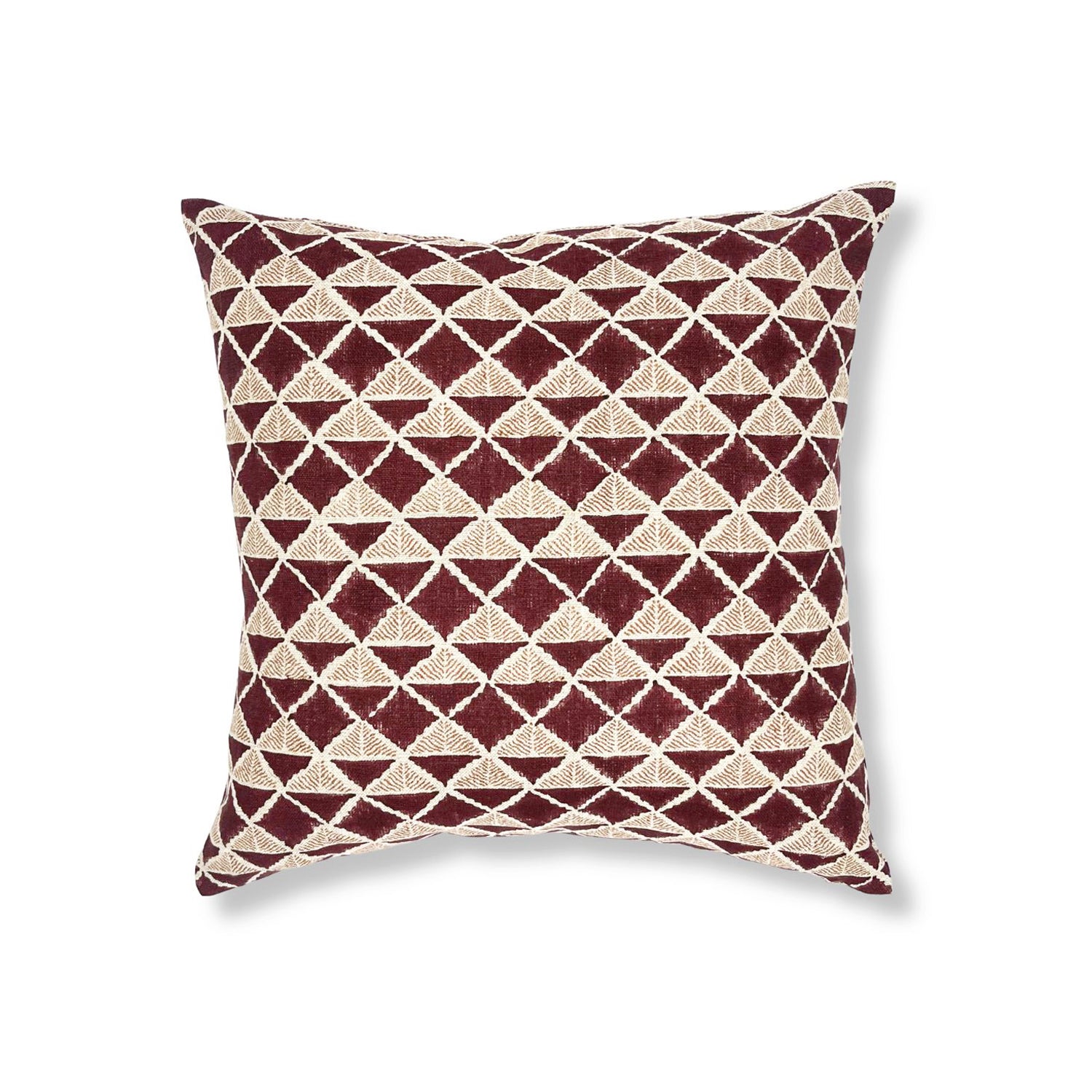 Block printed pillow with wine purple diamonds and rust brown cross hatched lines.