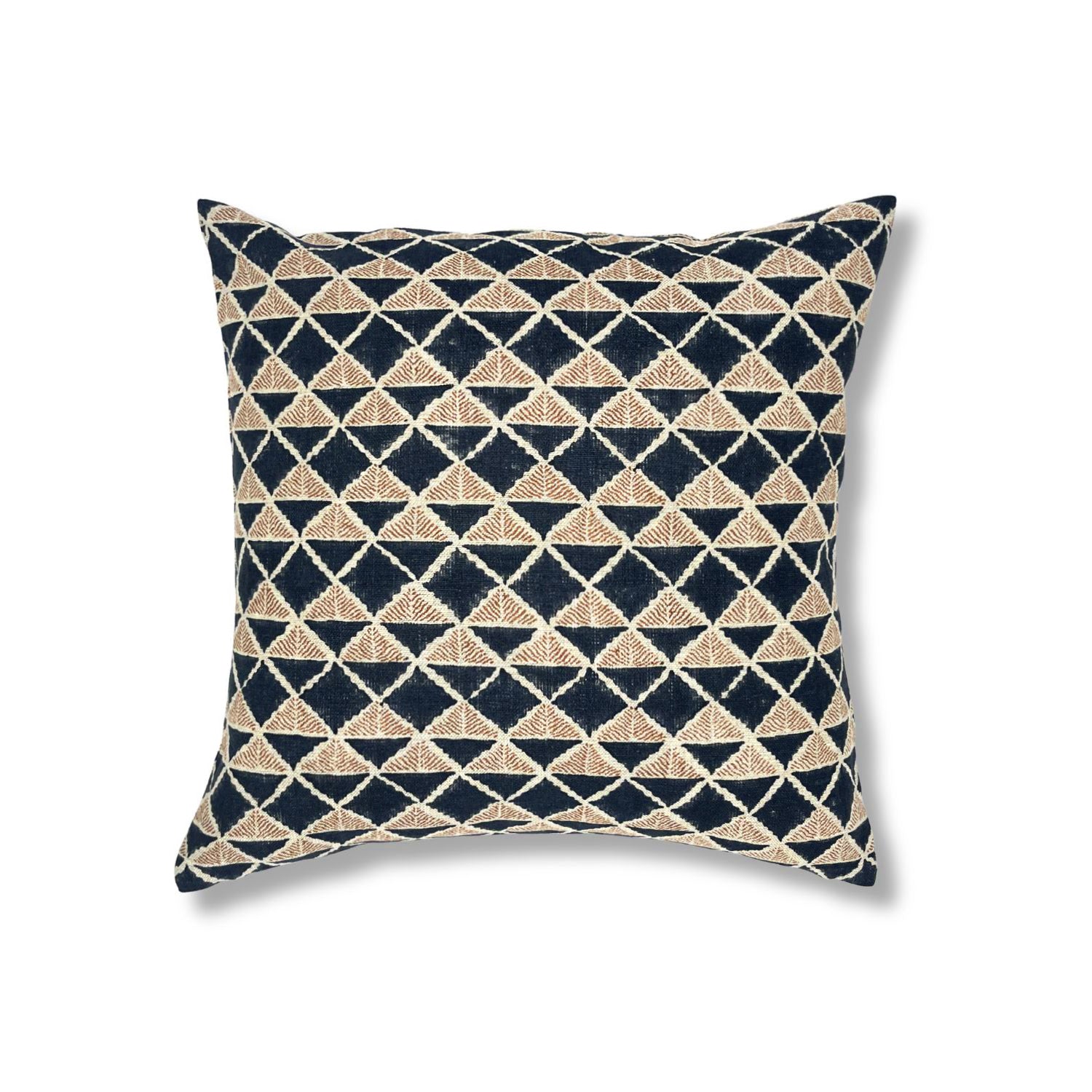 Block printed pillow with navy blue diamonds and rust brown cross hatched lines.