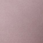 A swatch of linen fabric in a solid mauve color.