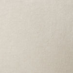 A swatch of old-world linen fabric in a solid cream color.