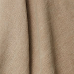 A draped swatch of blended linen fabric in a solid tan color.