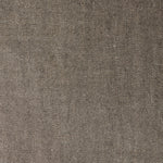 A swatch of linen fabric with a small-scale pattern of diagonal stripes in dark brown and tan.