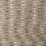 A swatch of linen fabric in a small-scale dotted pattern in tan and dark brown.