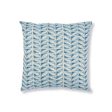 Block printed throw pillow with geometric leaf pattern in shades of light blue on a white background.