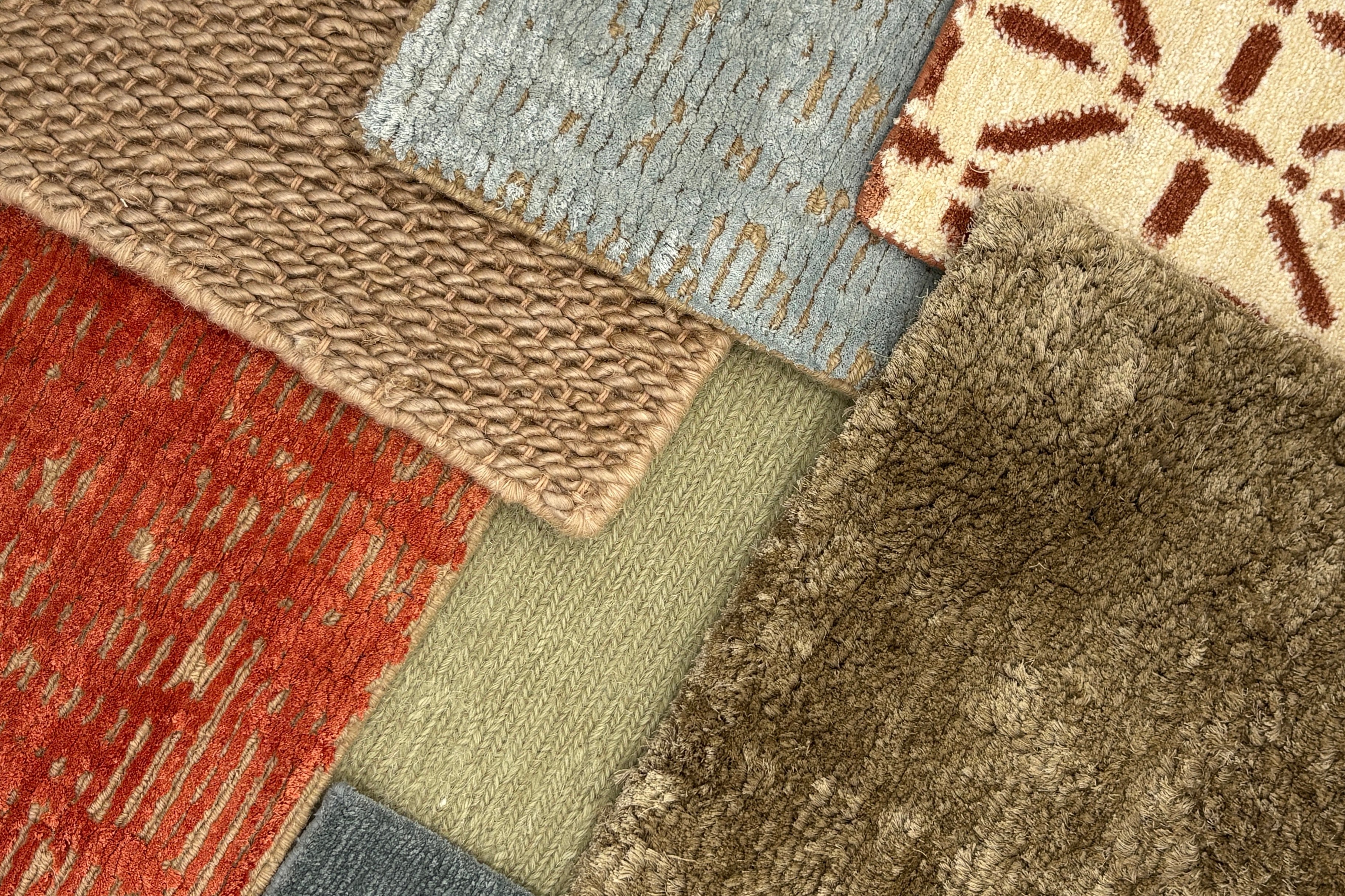 Close-up of a multicolored textured rugs with geometric patterns.