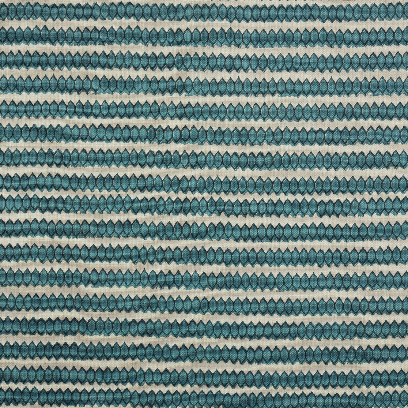 Swatch of fabric with rows of hand-drawn navy and turquoise honeycomb shapes on a cream background.