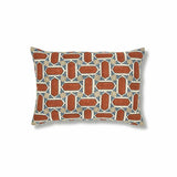 Block printed lumbar pillow with geometric mosaic design in rust red, blue and tan.