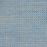 Textured handwoven carpet in light blue