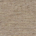 Textured handwoven carpet in light brown.