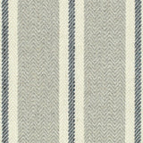 Broadloom carpet in herringbone weave in mixed width stripes in grey, cream and navy blue.