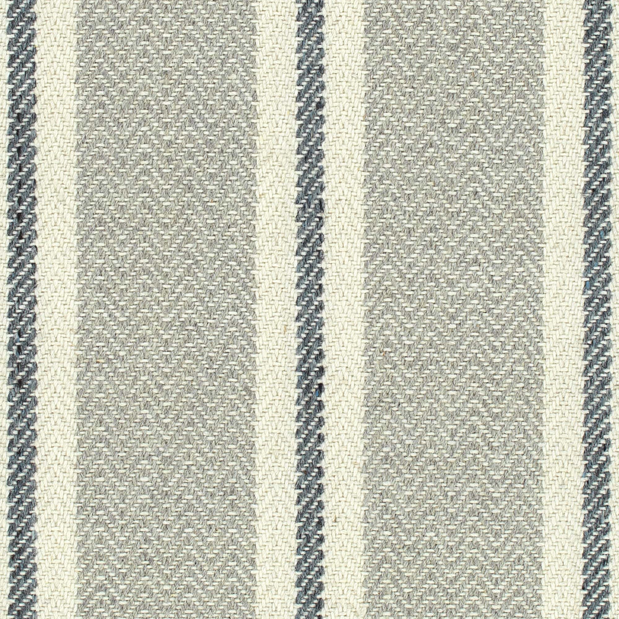 Broadloom carpet in herringbone weave in mixed width stripes in grey, cream and navy blue.