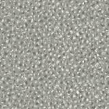 Detail of wallpaper in a painterly animal print in white and tan on a blue-gray field.