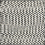 Textured rug with a herringbone pattern in white and slate blue. 