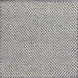 Textured rug with a herringbone pattern in white and light purple