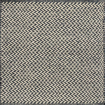 Textured rug with a herringbone pattern in white and navy blue