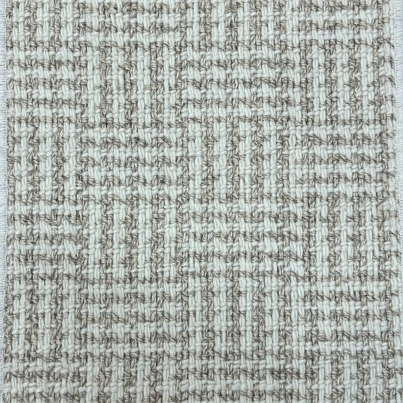 Broadloom carpet with houndstooth check pattern in cream and oatmeal.