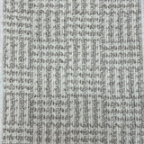 Broadloom carpet with houndstooth check pattern in cream and grey.