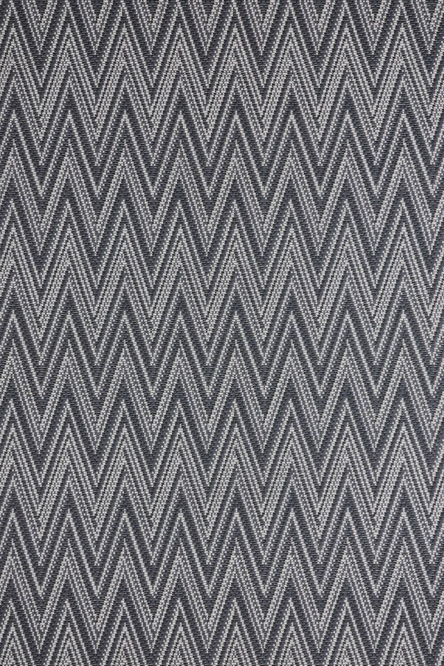 Broadloom carpet in dense zigzag stripe in charcoal and white. 