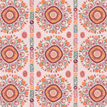 Detail of a hand-drawn Suzani motif in shades of pink, orange and slate blue on a pale pink ground.