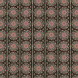 Full repeat image of a hand-drawn Suzani motif in shades of pink, turquoise and brown on a dull black ground.