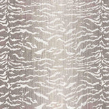Broadloom carpet in a tiger inspired pattern in shades of taupe.