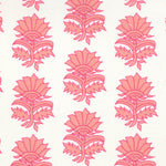 Detail of fabric in a repeating thistle print in pink and orange on a white field.