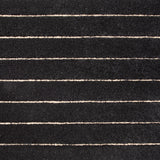 Broadloom carpet in a wide stripe pattern in dark grey and cream.