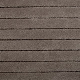 Broadloom carpet in a wide stripe pattern in tonal taupe.
