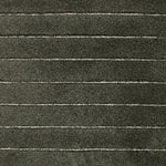 Broadloom carpet in a wide stripe pattern in deep dark green.