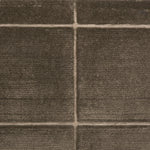 Textural performance broadloom carpet in grid design in brown