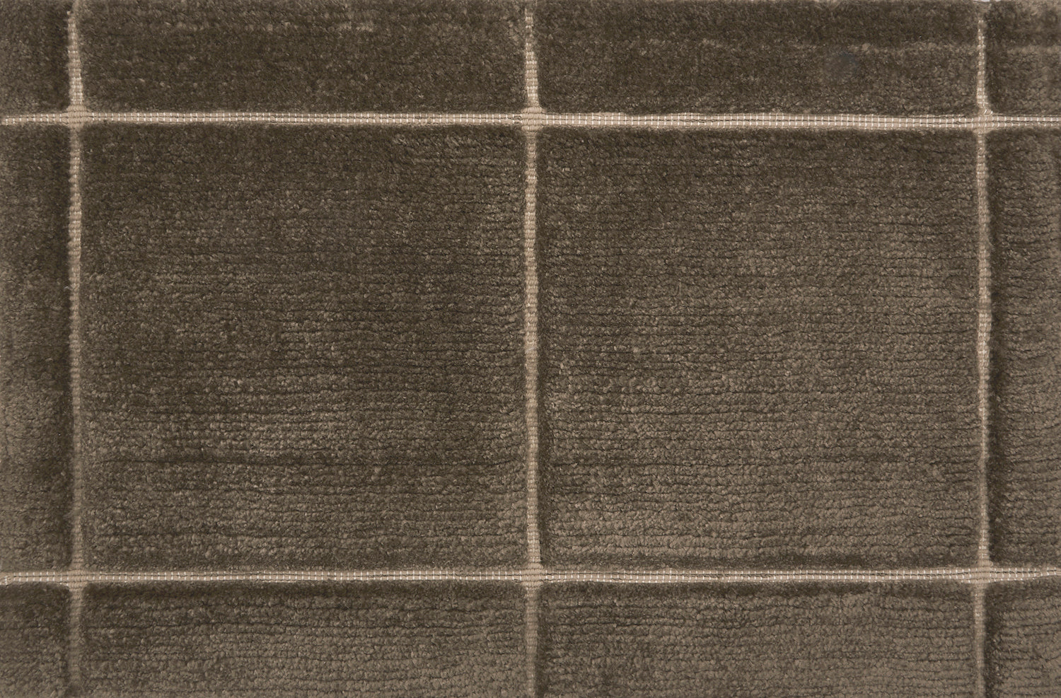 Textural performance broadloom carpet in grid design in brown