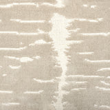 Broadloom carpet in a dimensional abstract painterly pattern in beige on a cream field.