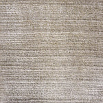Broadloom carpet swatch in a solid pattern in a light tan design