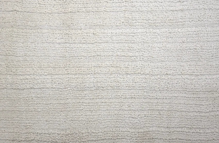 Broadloom carpet swatch in a solid pattern in a light grey design