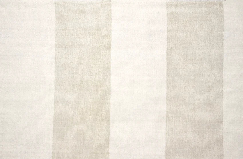 Broadloom carpet swatch in a stripe pattern in a cream design