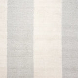 Broadloom carpet swatch in a stripe pattern in a light grey design